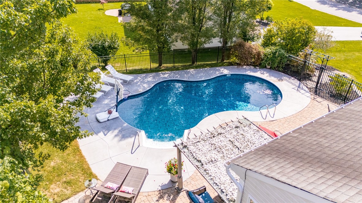 4 Chadwick Manor Perinton, NY 14450 - Photo 40 of 47 Enjoy the sunshine with this luxurious in-ground p