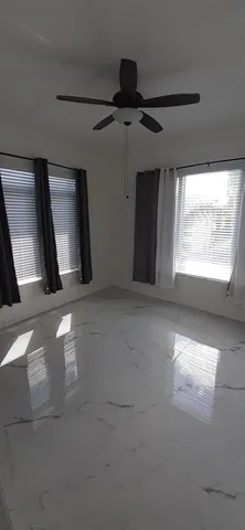 a kitchen with a microwave and cabinets