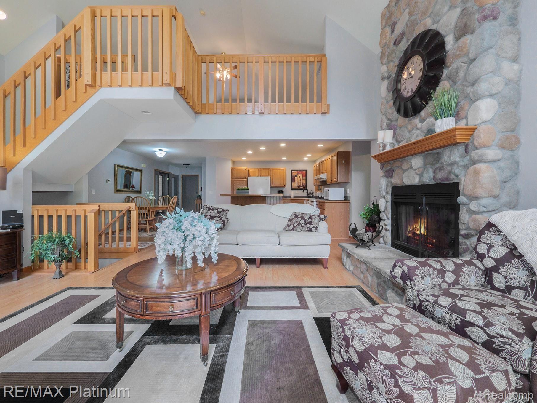 2880 West Coon Lake Road Howell, MI 48843 - Photo 11 of 38 Great Room. Loft above
