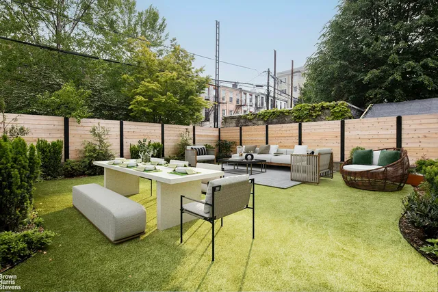 a view of swimming pool and outdoor seating