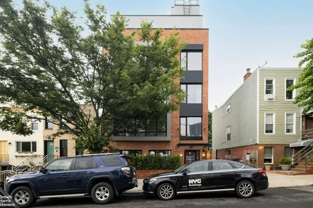 a car parked in front of a house