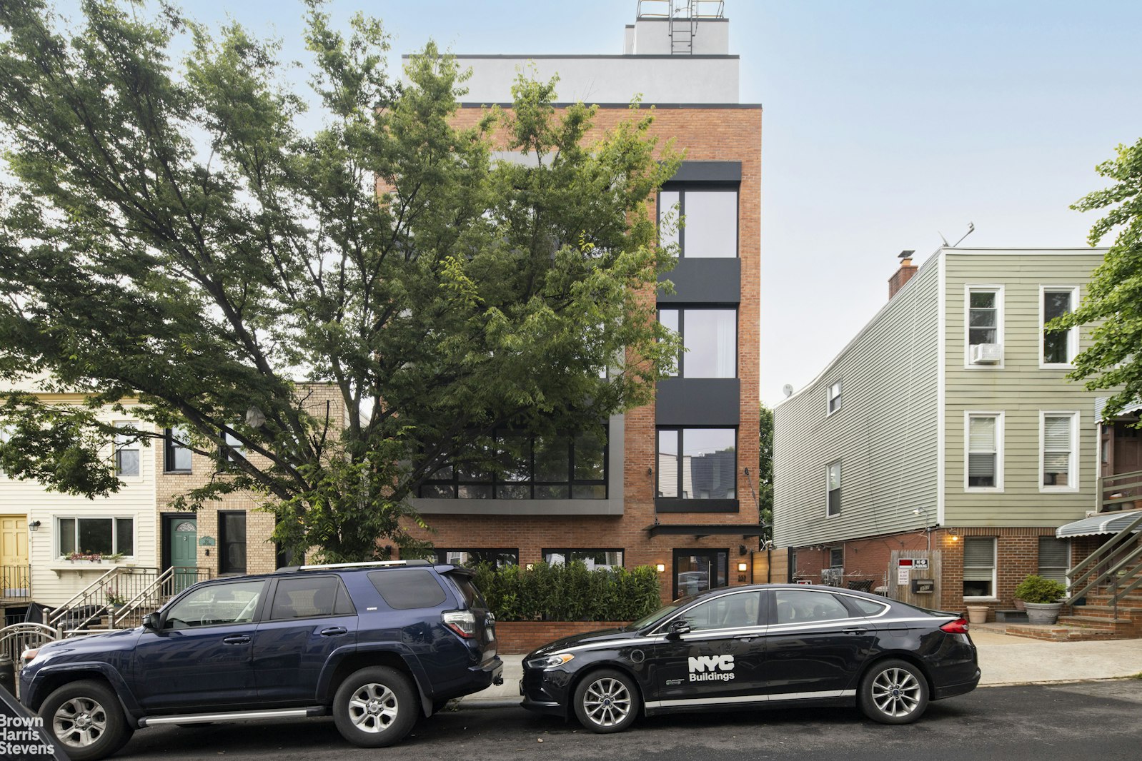 353 20th Street Brooklyn, NY 11215 - Photo 14 of 17 a car parked in front of a house