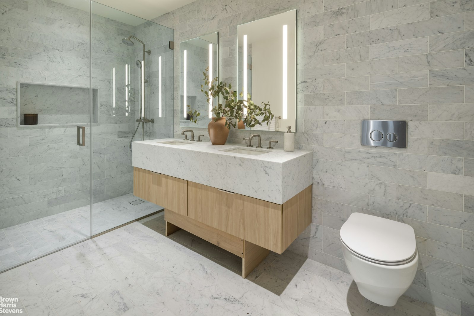 353 20th Street Brooklyn, NY 11215 - Photo 7 of 17 a bathroom with a sink a toilet and shower