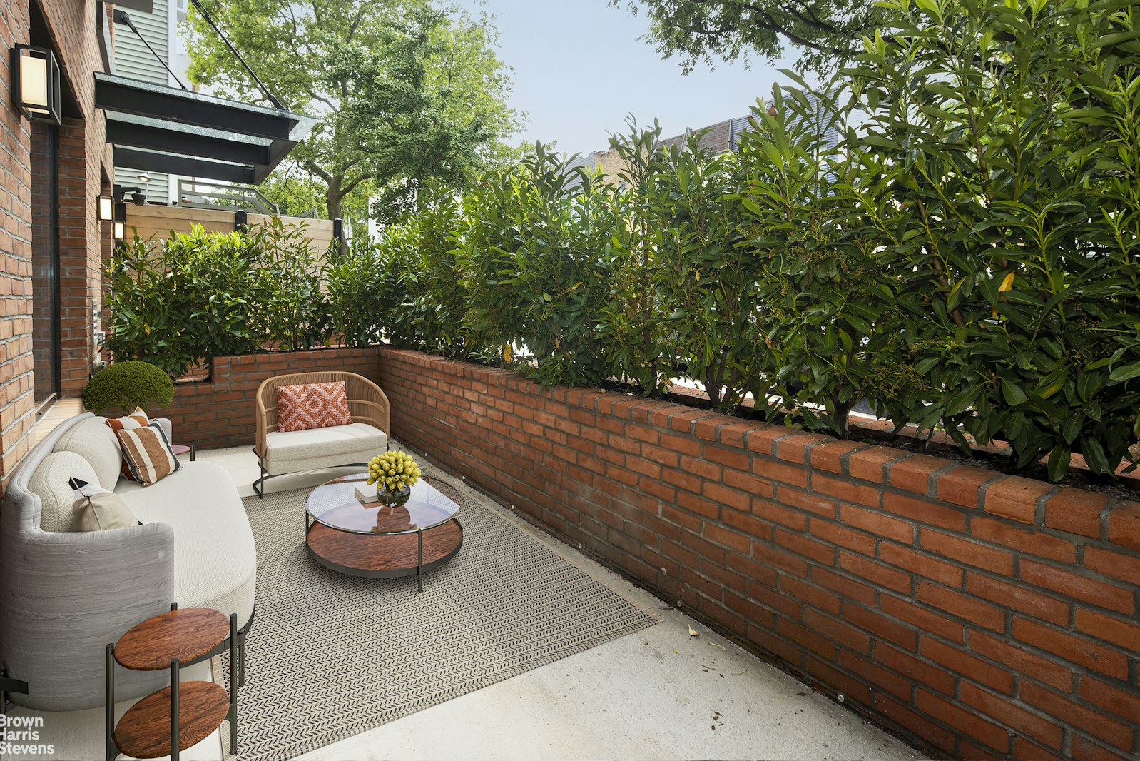 353 20th Street Brooklyn, NY 11215 - Photo 8 of 17 a view of a patio with table and chairs and a wooden fence