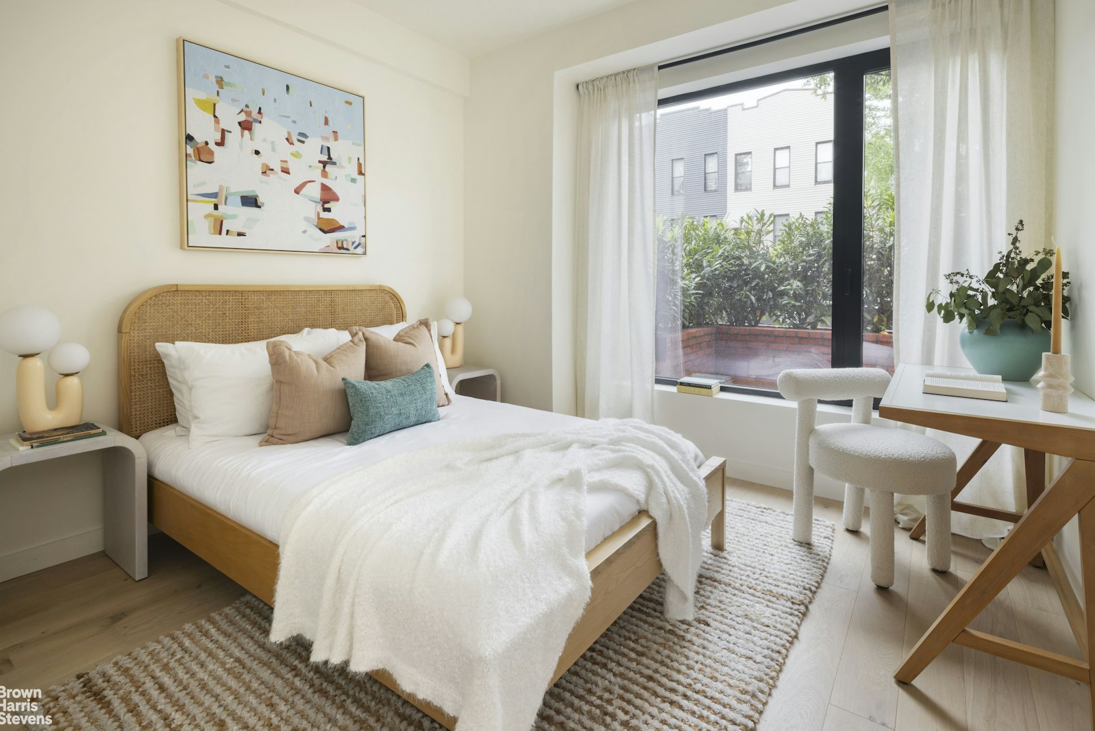 353 20th Street Brooklyn, NY 11215 - Photo 9 of 17 a spacious bedroom with a bed and a large window