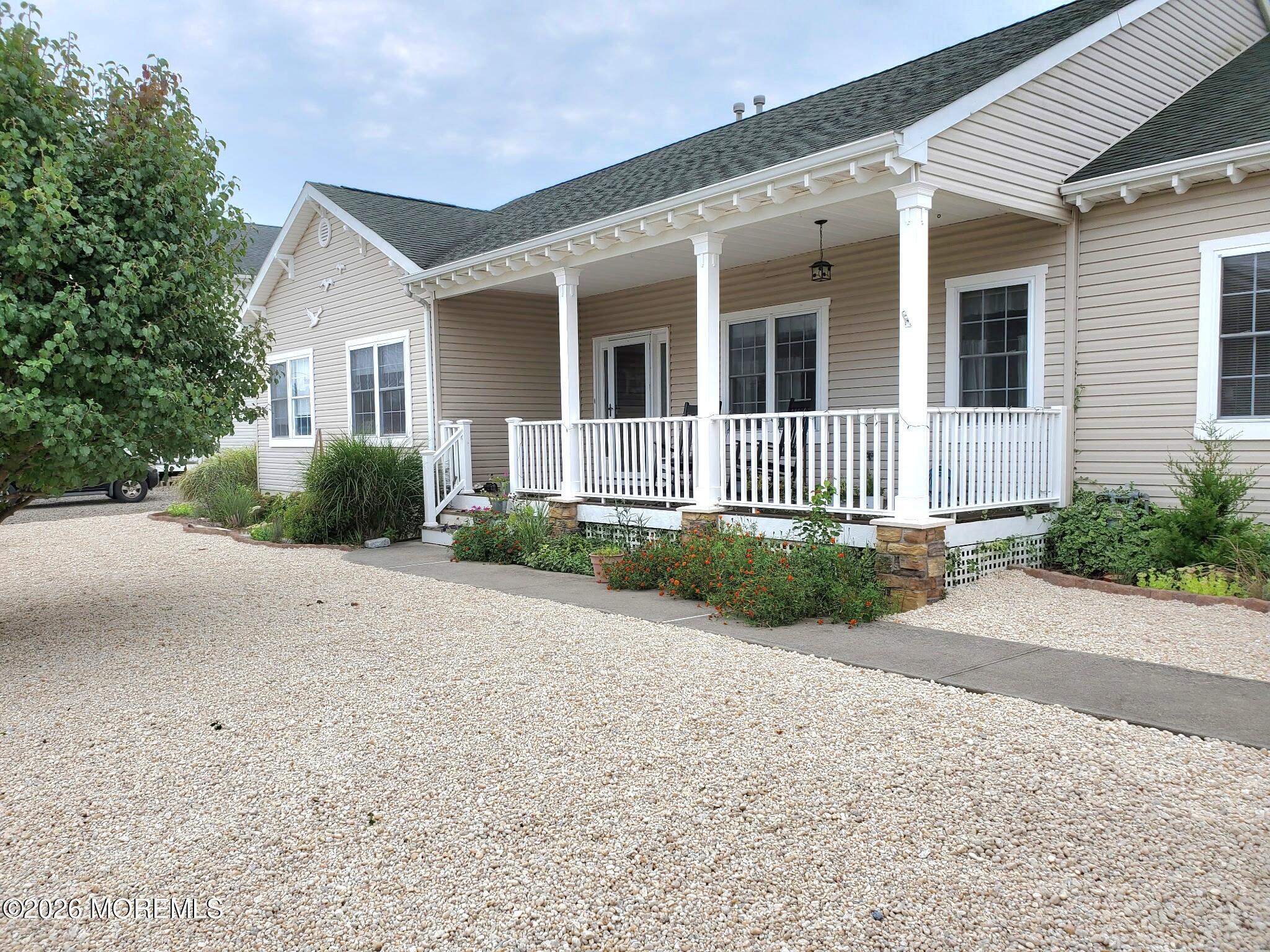 front view of a house with a small yard