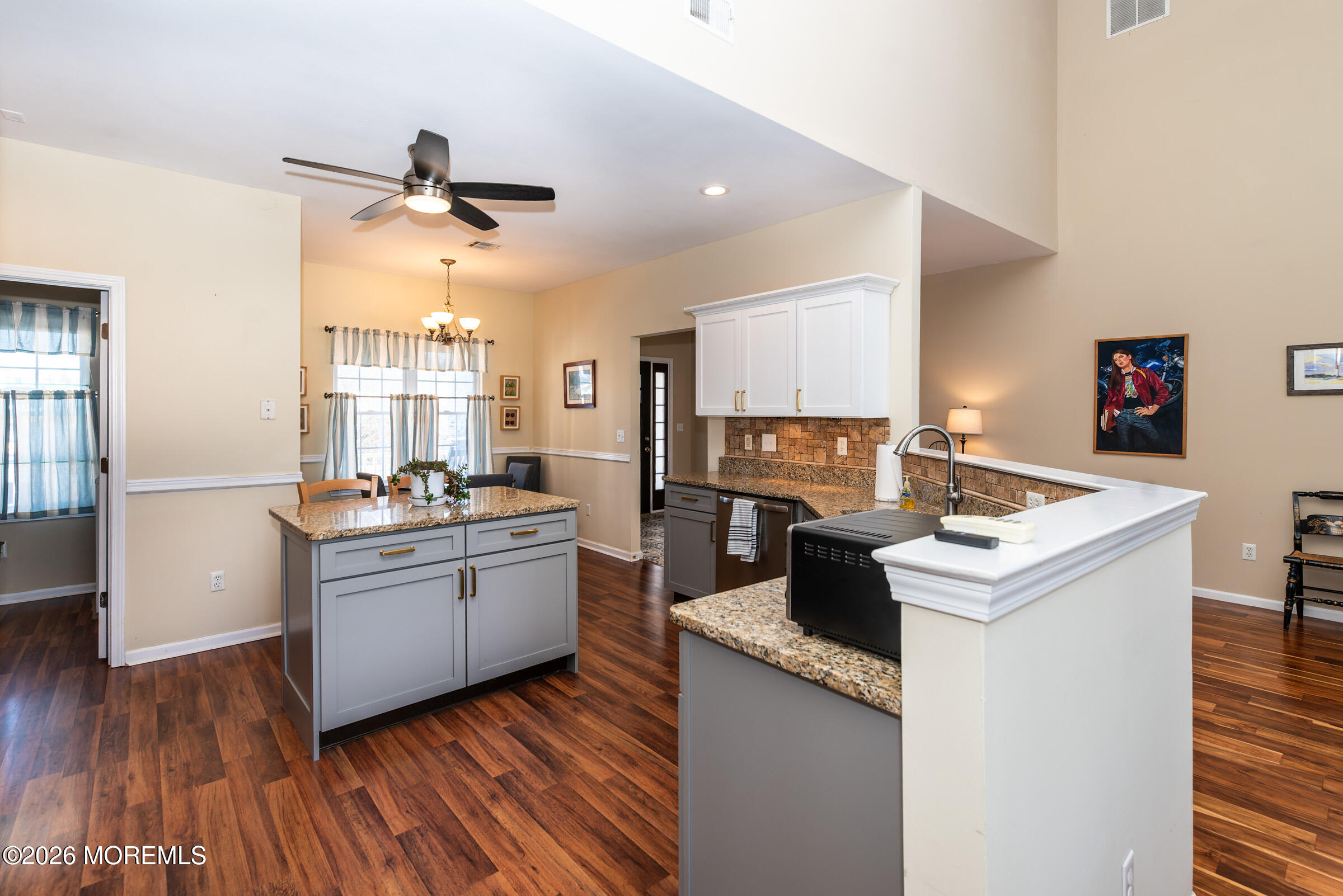 1609 Tamiami Road Forked River, NJ 08731 - Photo 16 of 49 a kitchen with a stove and a refrigerator