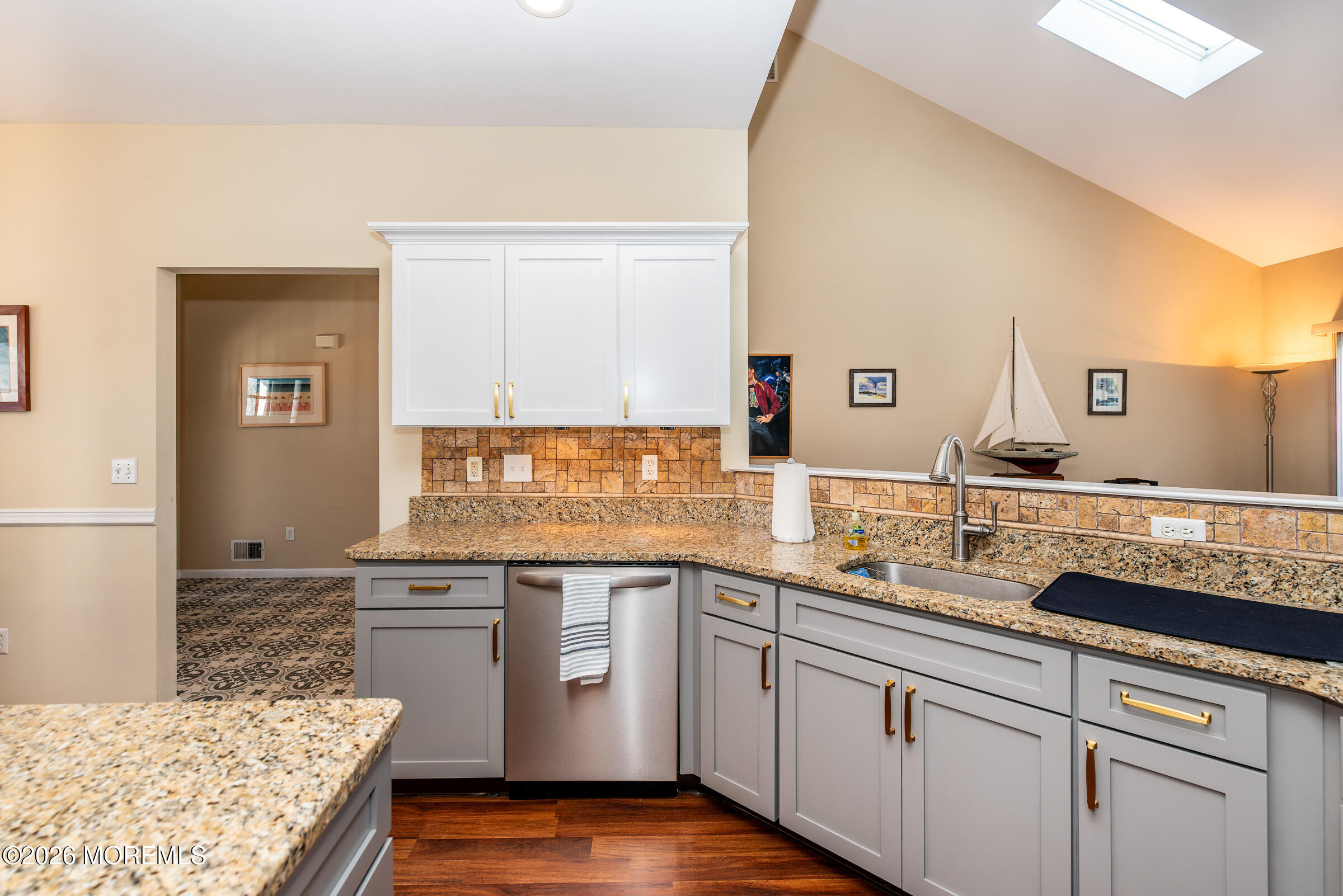1609 Tamiami Road Forked River, NJ 08731 - Photo 19 of 49 a kitchen with a sink and cabinets