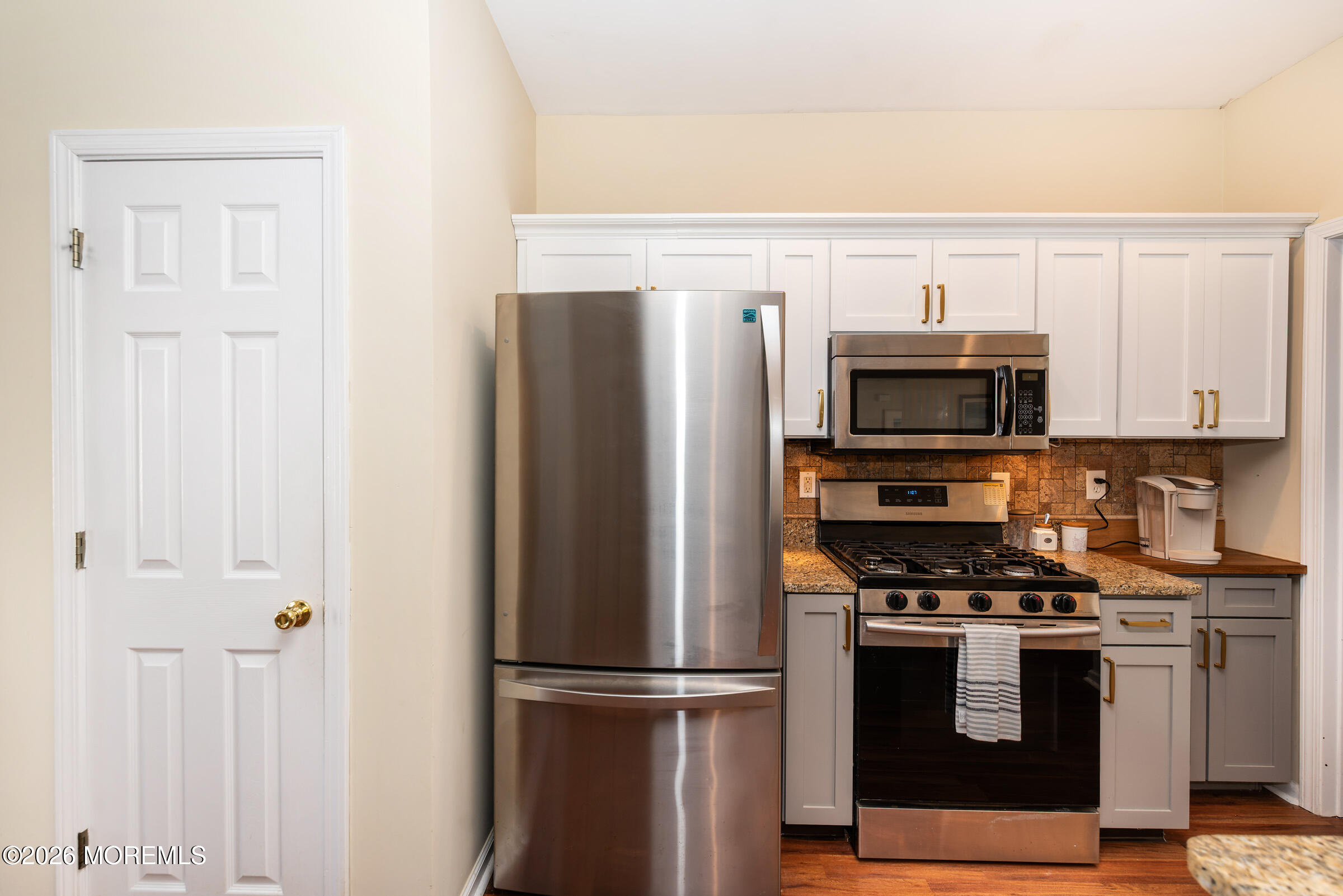 1609 Tamiami Road Forked River, NJ 08731 - Photo 22 of 49 a kitchen with stainless steel appliances and refrigerator