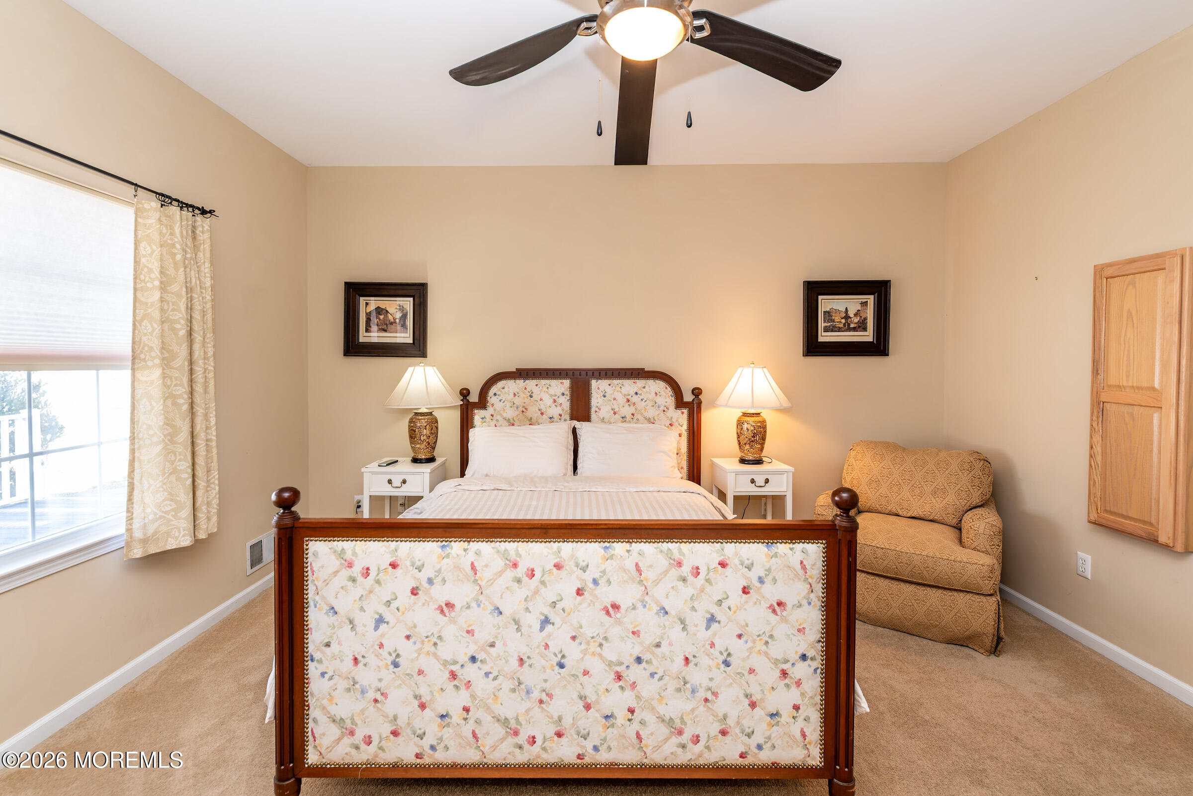 1609 Tamiami Road Forked River, NJ 08731 - Photo 35 of 49 a bedroom with a bed and wooden floor