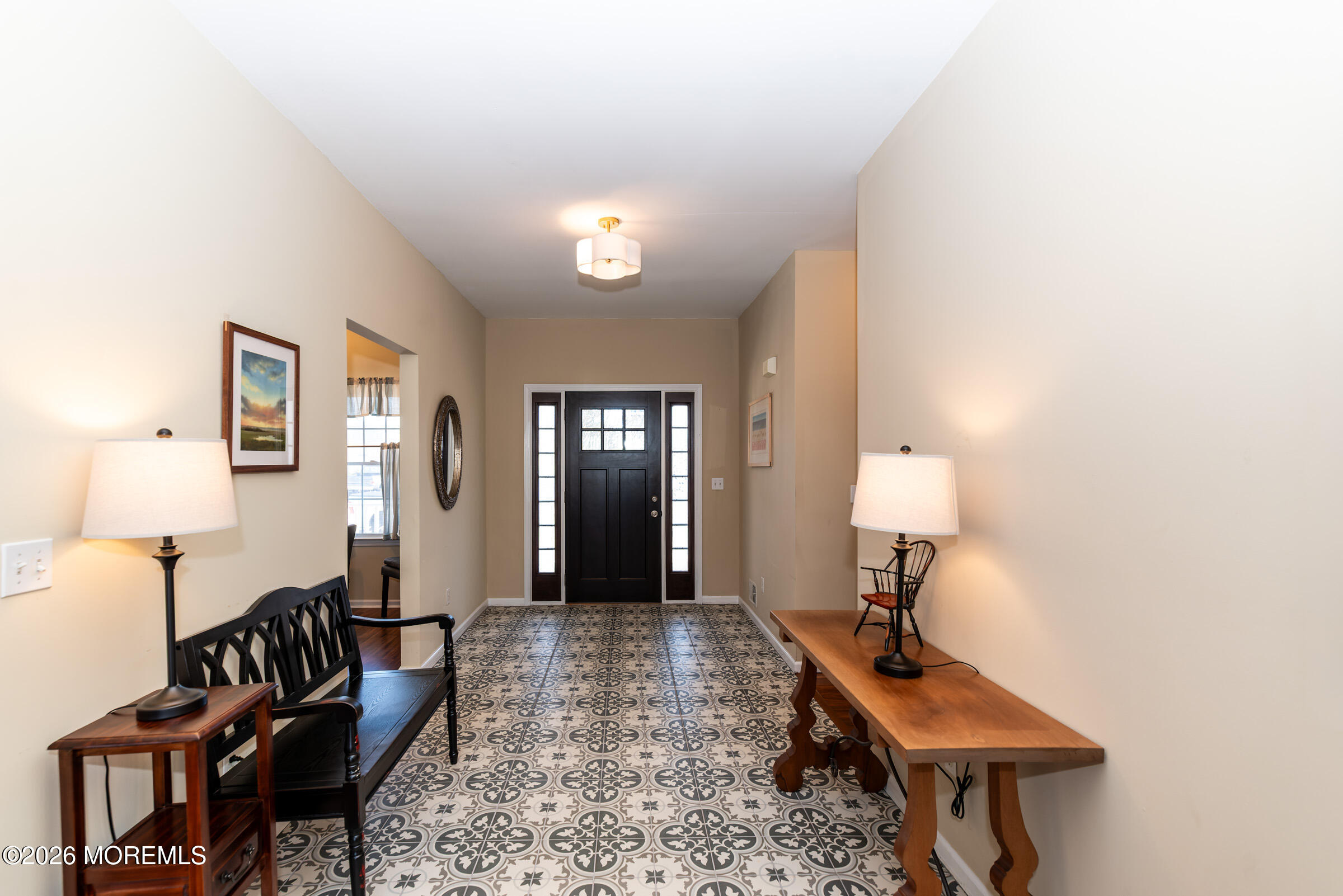 1609 Tamiami Road Forked River, NJ 08731 - Photo 8 of 49 a living room with furniture and a lamp