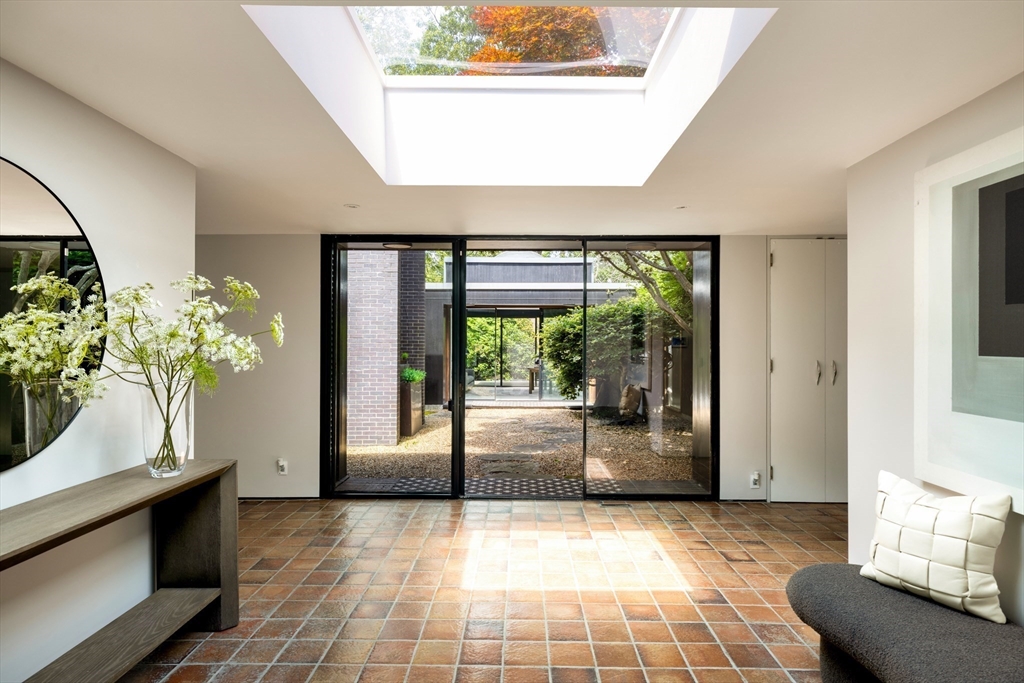 50 Crestwood Road Newton, MA 02465 - Photo 2 of 18 a lobby with furniture and potted plant