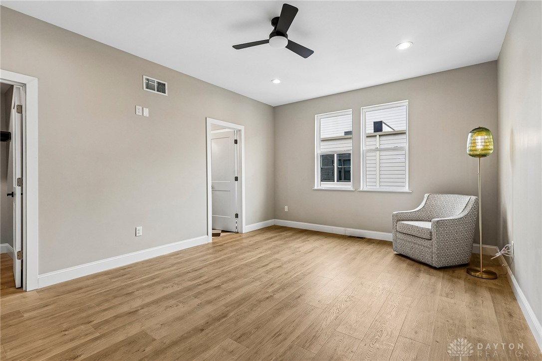 3906 Edwards Road, Unit C Cincinnati, OH 45209 - Photo 27 of 46 This airy room features durable flooring and ample natural light, ideal for peaceful living.