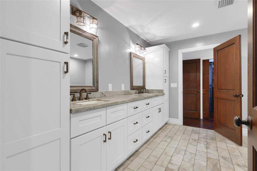 14701 Southwest 63rd Street Southwest Ranches, FL 33330 - Photo 23 of 64 a bathroom with a granite countertop sink mirror and double