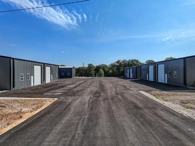 a view of a backyard of the house