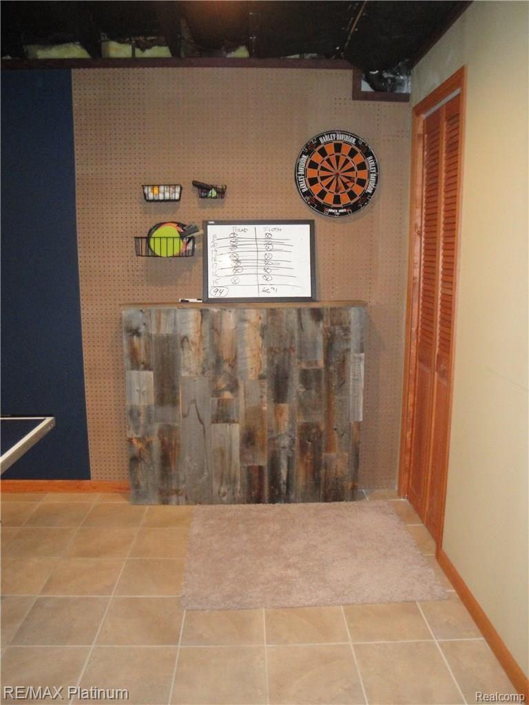 1201 Oakcrest Road Howell, MI 48843 - Photo 47 of 57 Nice place for other games! (Water meter is behind this panel)