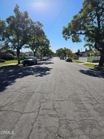 a view of street with houses