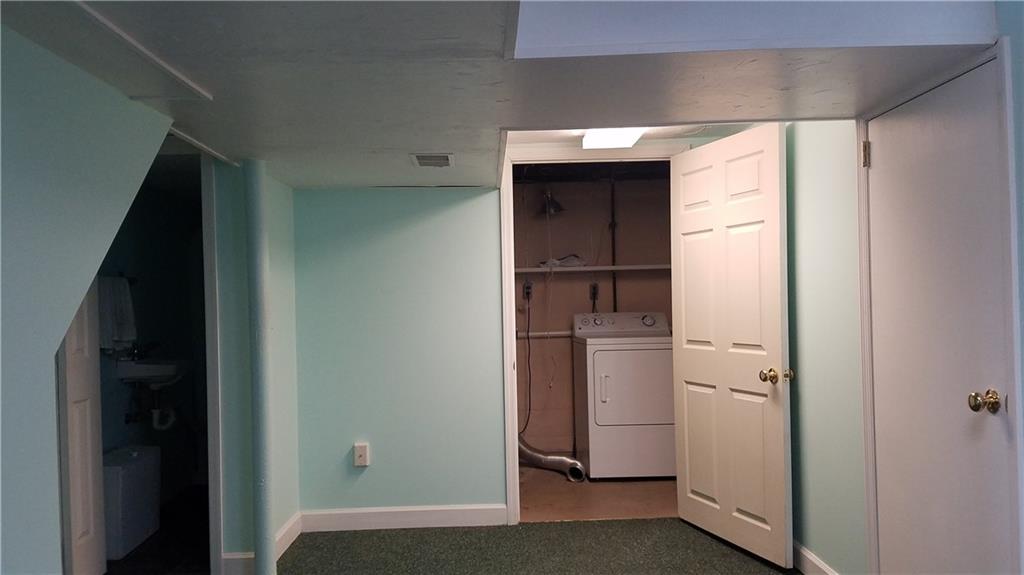 491 Old Farm Road Pittsburgh, PA 15228 - Photo 16 of 23 Finished lower game room has powder room and laundry room.