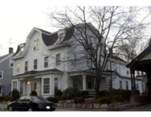 a view of house with yard