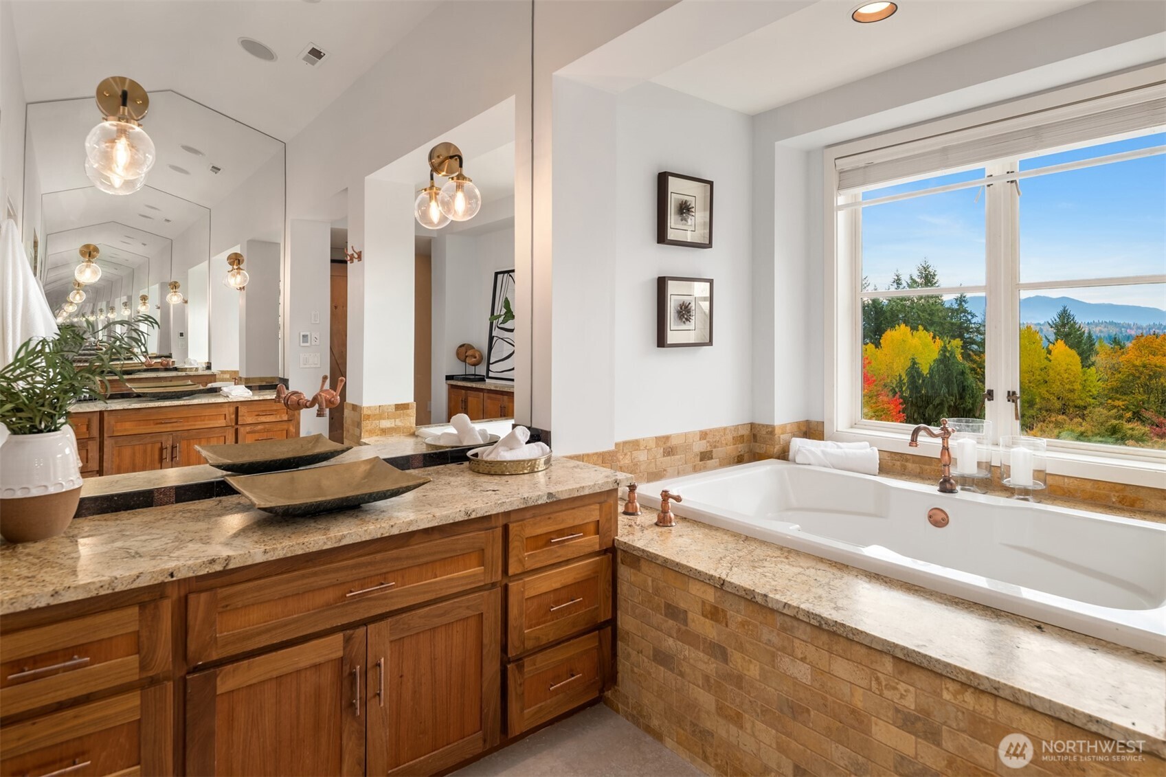 26133 Northeast 34th Street Redmond, WA 98053 - Photo 24 of 40 a bathroom with a granite countertop sink and a mirror