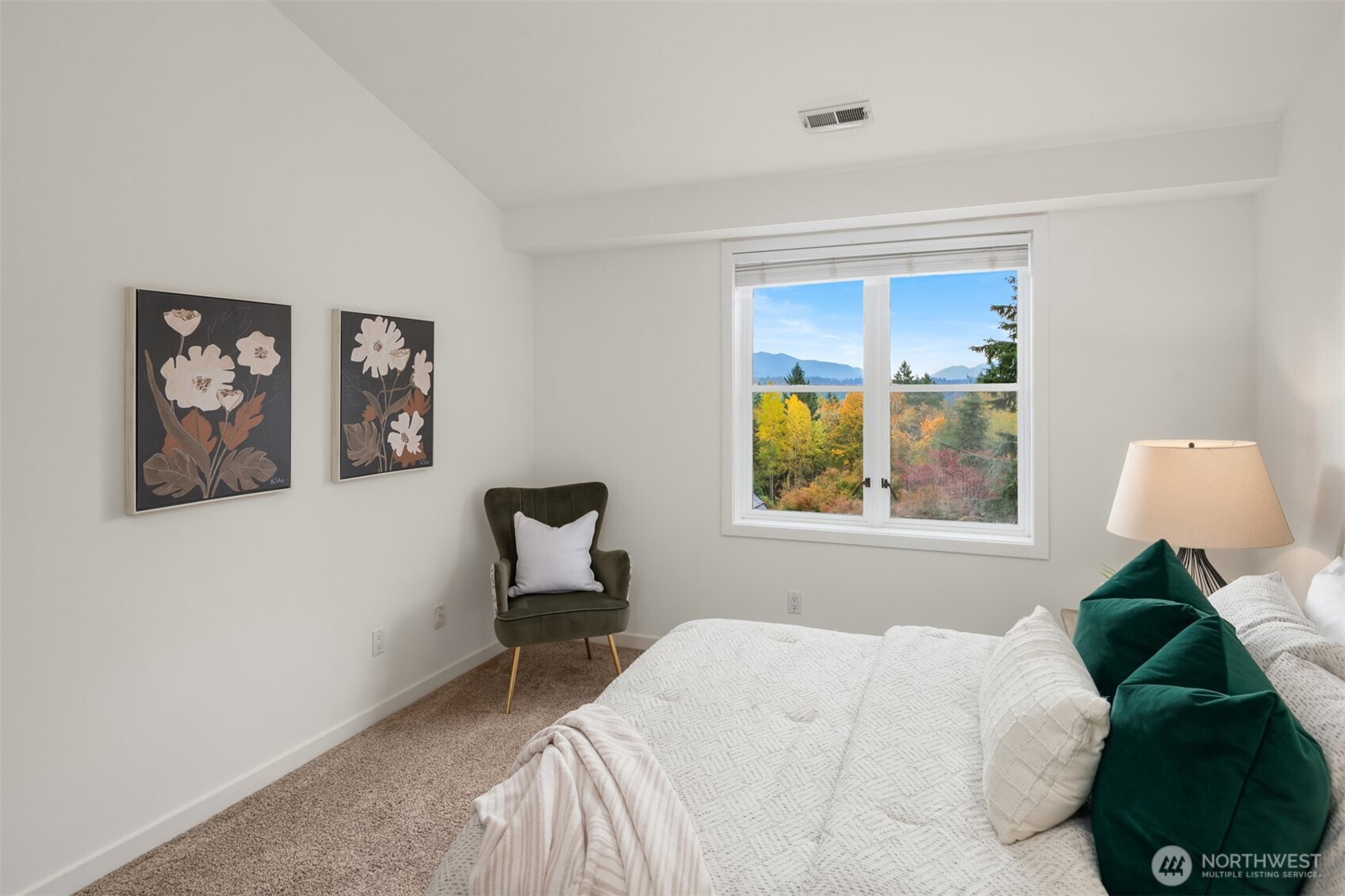 26133 Northeast 34th Street Redmond, WA 98053 - Photo 29 of 40 a bedroom with a bed and a window