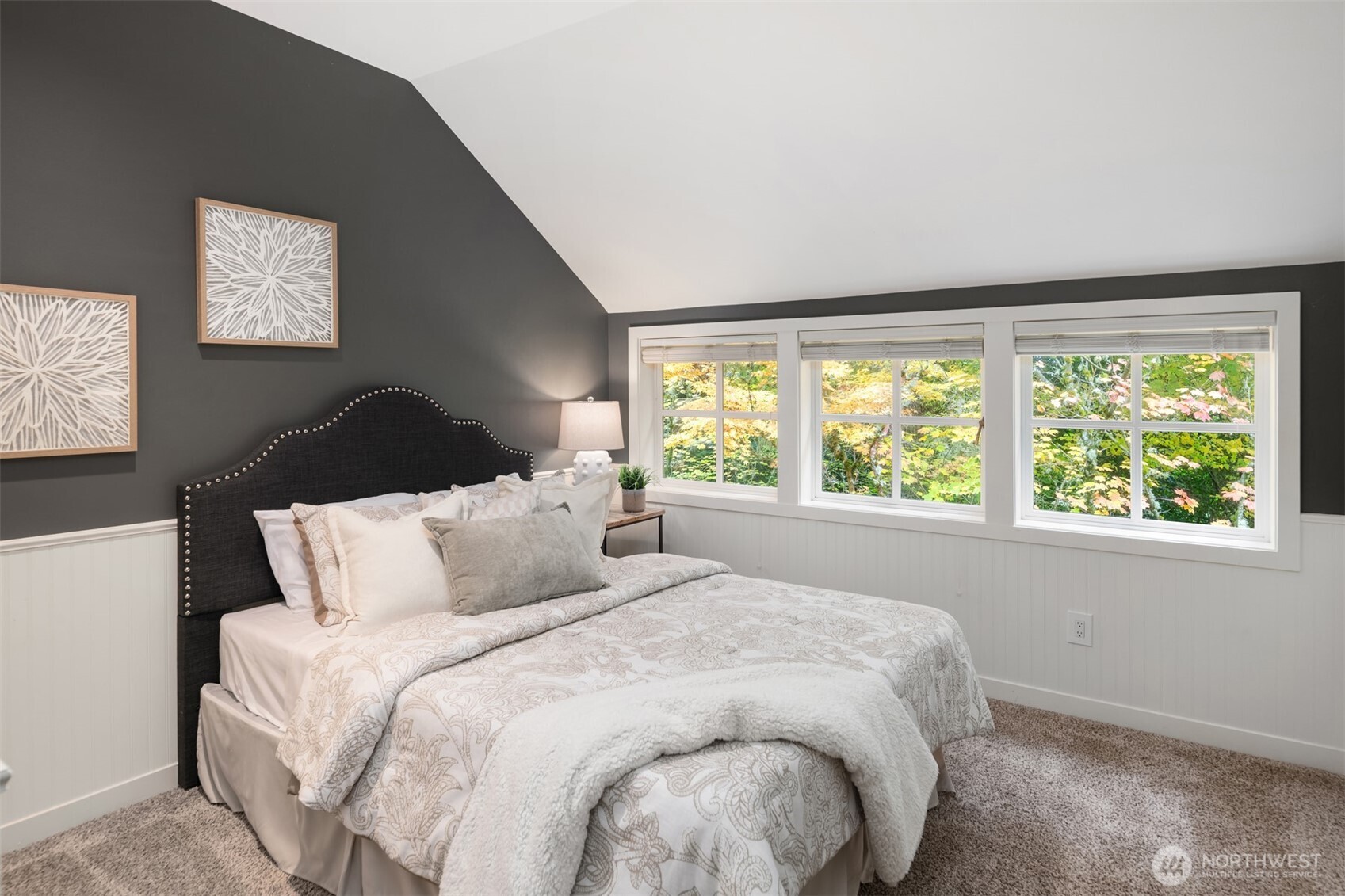 26133 Northeast 34th Street Redmond, WA 98053 - Photo 31 of 40 a bedroom with a large bed and a large window