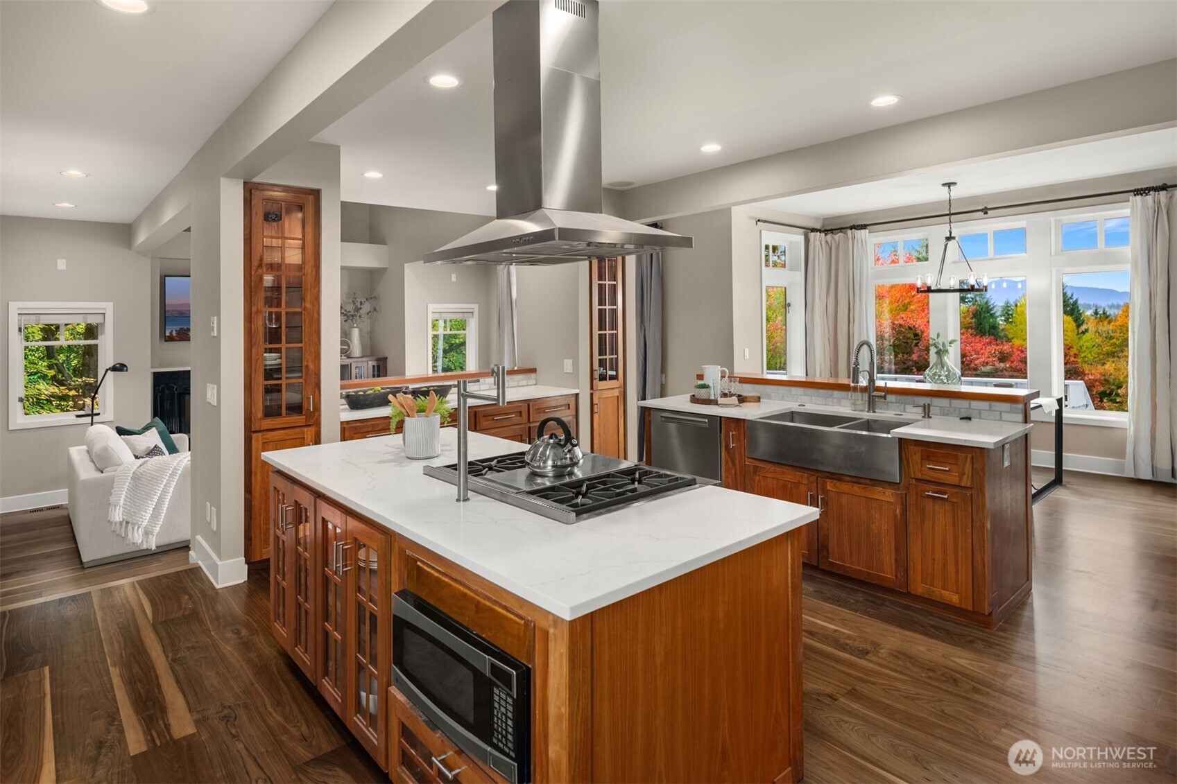 26133 Northeast 34th Street Redmond, WA 98053 - Photo 9 of 40 a kitchen with stainless steel appliances granite countertop a stove and a sink