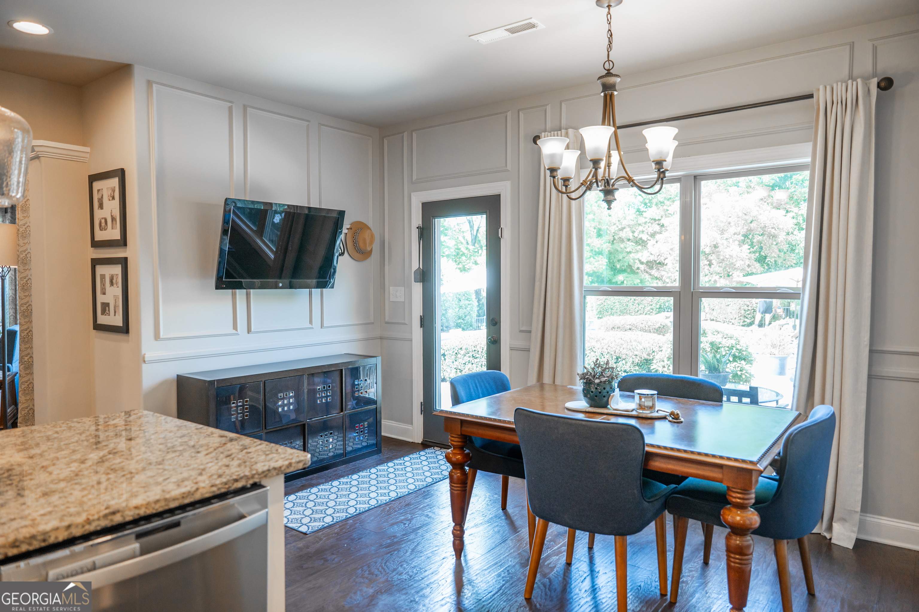 415 EAS Way Fayetteville, GA 30215 - Photo 12 of 70 a dining room with furniture window wooden floor and a chandelier
