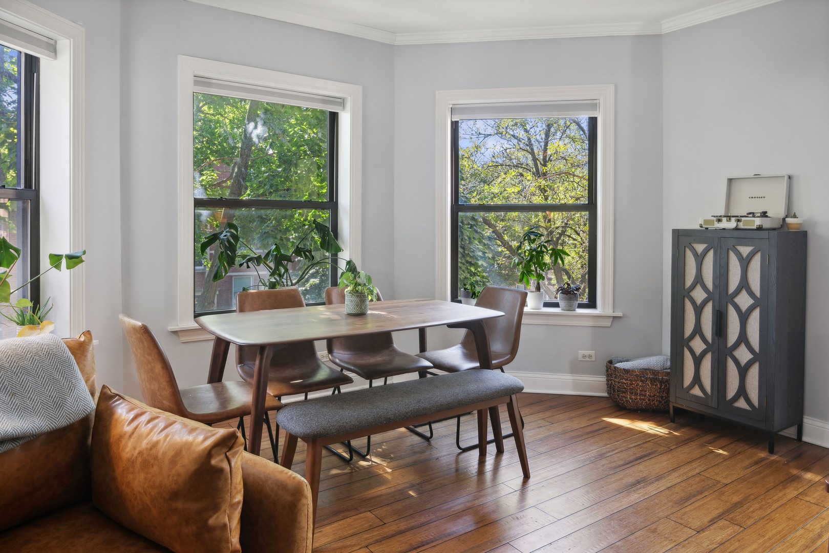 1254 West Eddy Street, Unit 2 Chicago, IL 60657 - Photo 2 of 14 a view of a dining room with furniture window and outside view