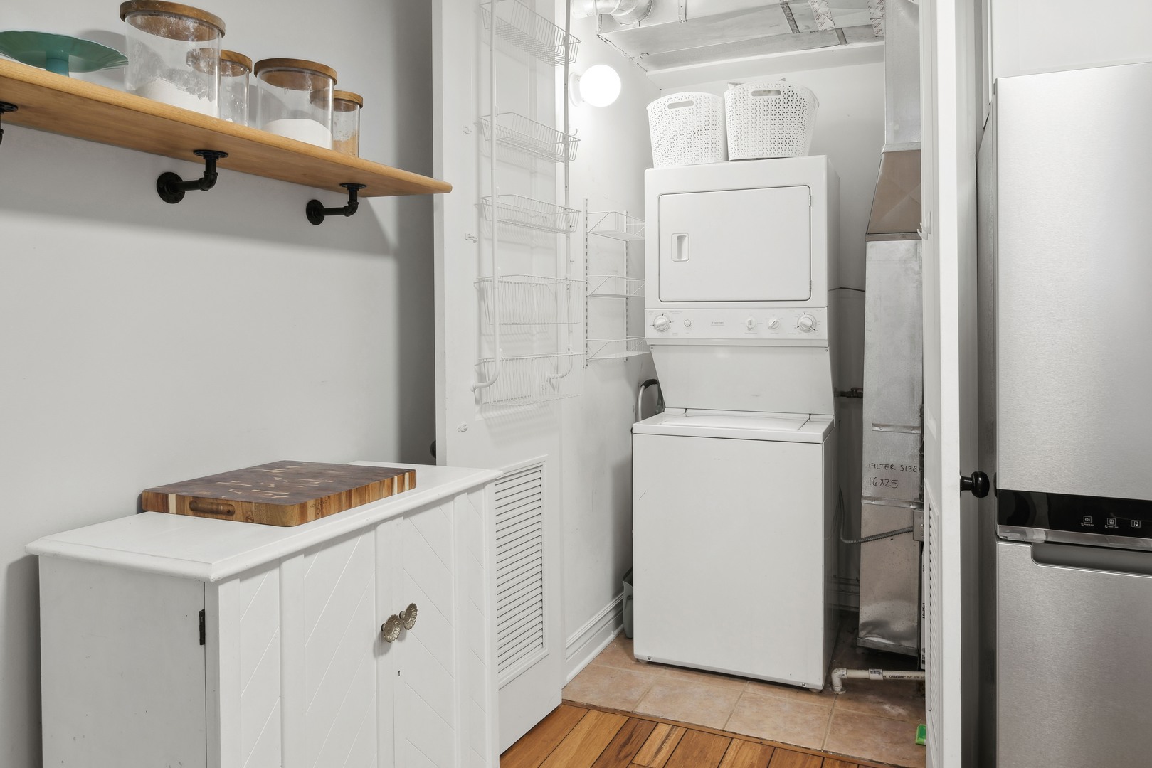 1254 West Eddy Street, Unit 2 Chicago, IL 60657 - Photo 7 of 14 a utility room with dryer and washer