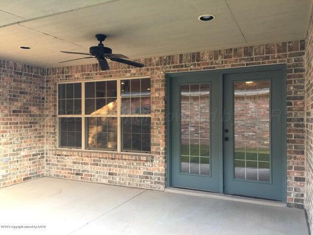 6911 Nick Street Amarillo, TX 79119 - Photo 6 of 6 a view of an entryway with a window