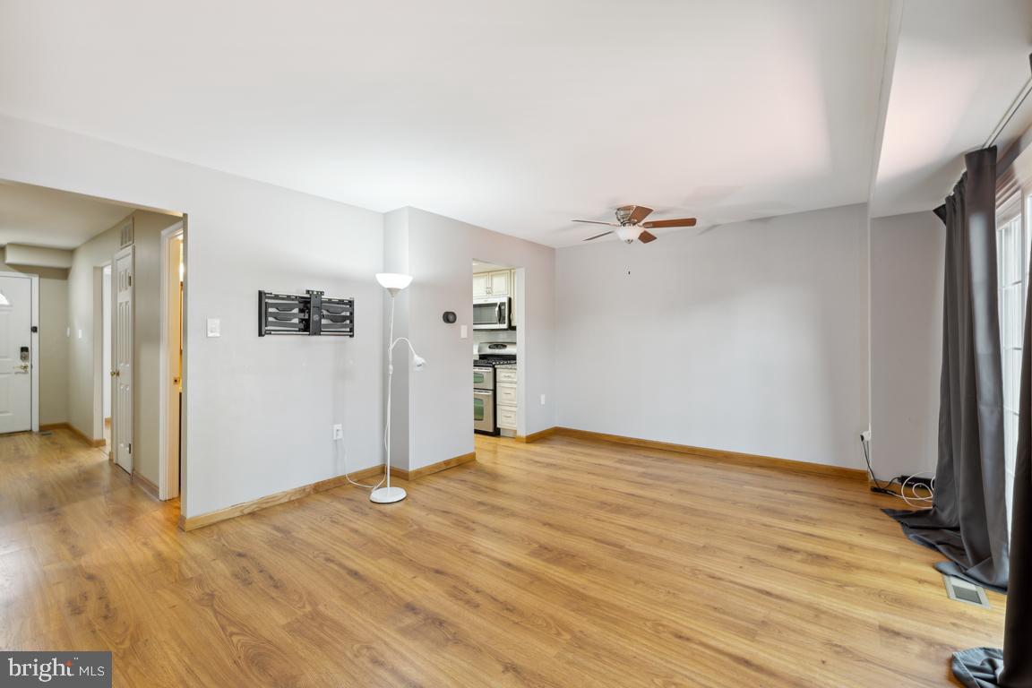 7448 Pohick Road Lorton, VA 22079 - Photo 11 of 25 Ceiling fan & walkout to rear yard from dining rm