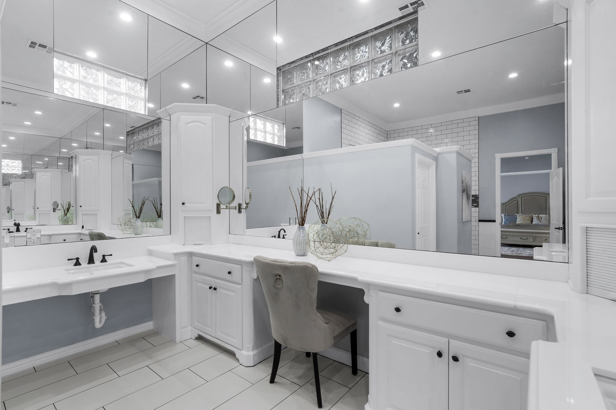 20002 Indigo Lake Drive Magnolia, TX 77355 - Photo 16 of 50 a bathroom with a sink double vanity and a mirror