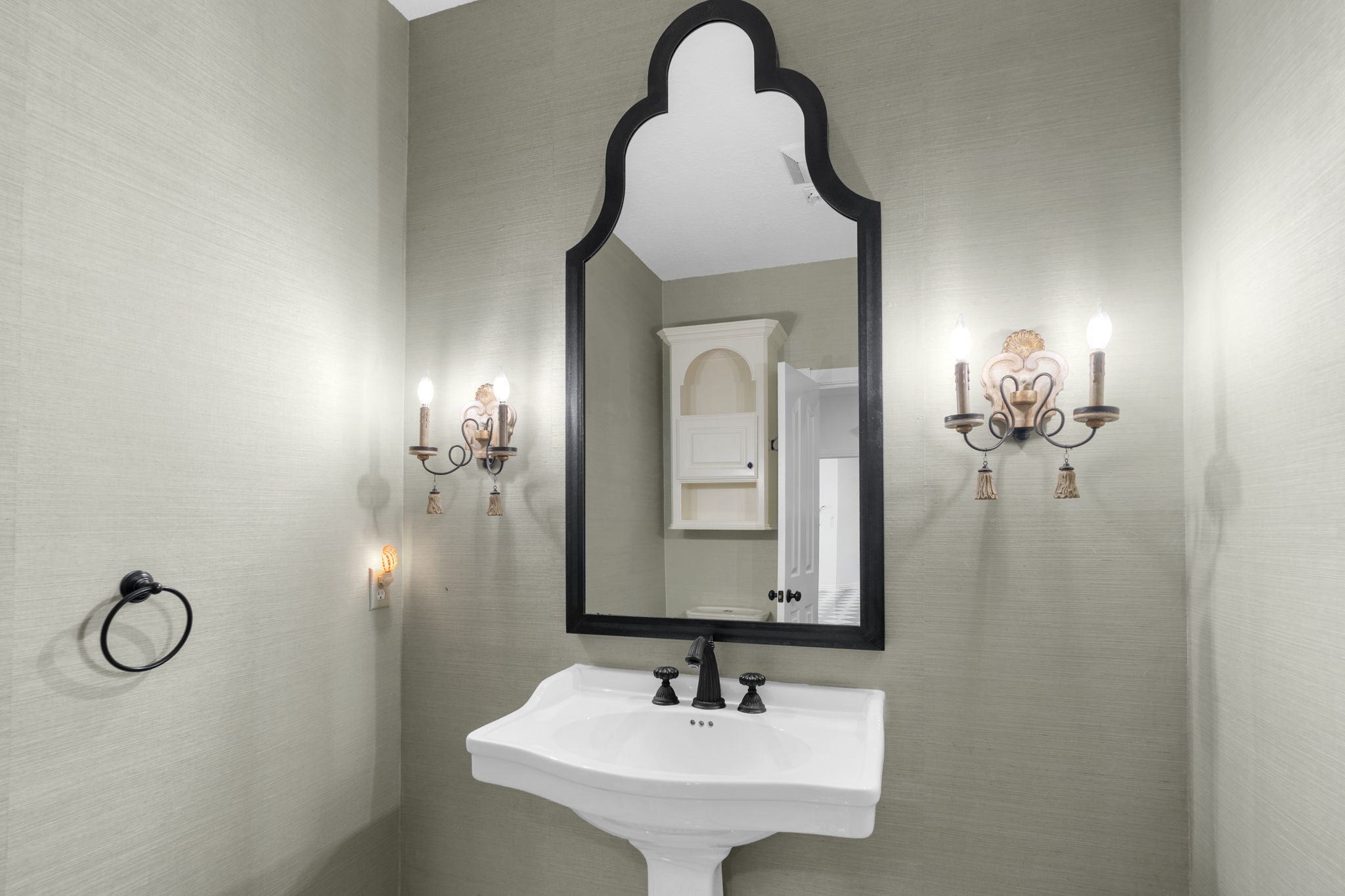 20002 Indigo Lake Drive Magnolia, TX 77355 - Photo 19 of 50 a bathroom with a sink and a mirror