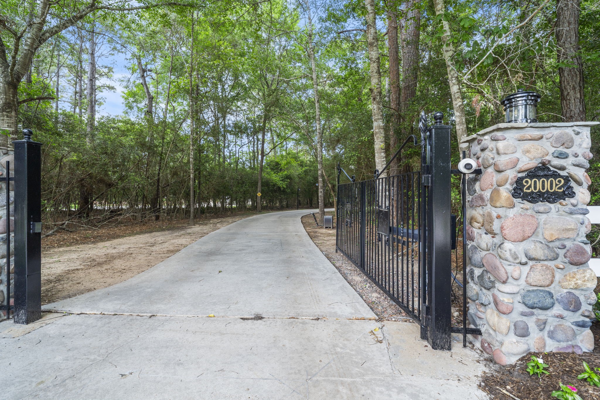 20002 Indigo Lake Drive Magnolia, TX 77355 - Photo 2 of 50 a view of backyard