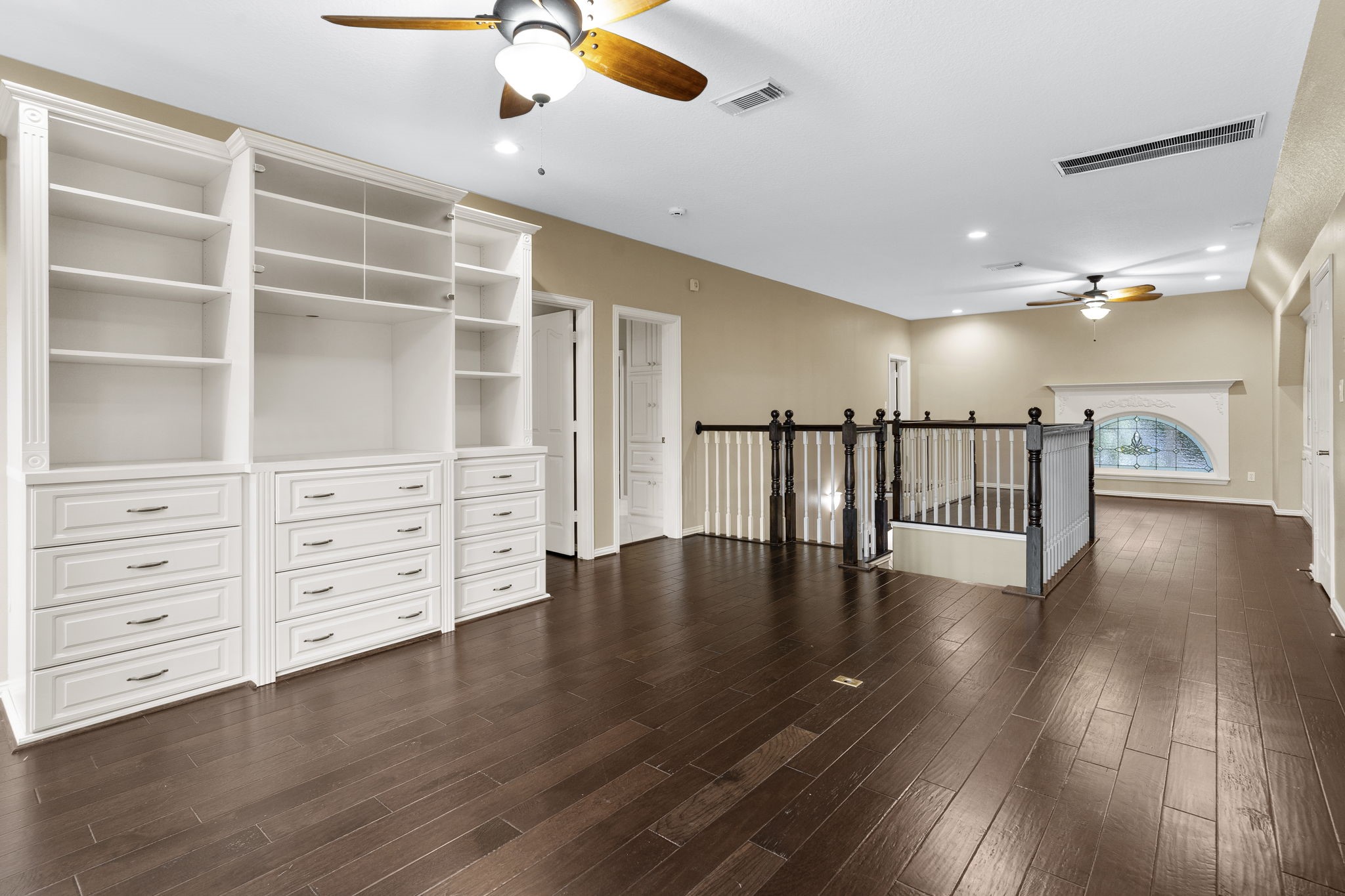 20002 Indigo Lake Drive Magnolia, TX 77355 - Photo 24 of 50 a view of an empty room with wooden floor