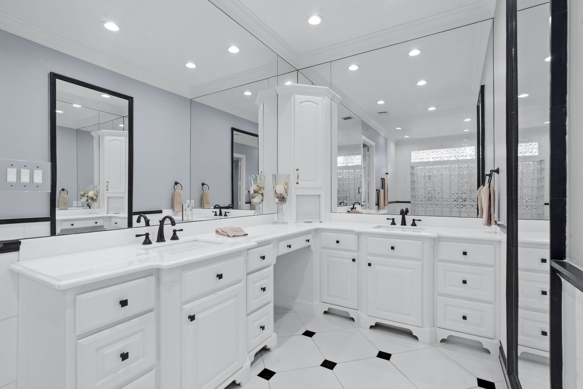 20002 Indigo Lake Drive Magnolia, TX 77355 - Photo 38 of 50 a large white bathroom with a double vanity sink mirror and