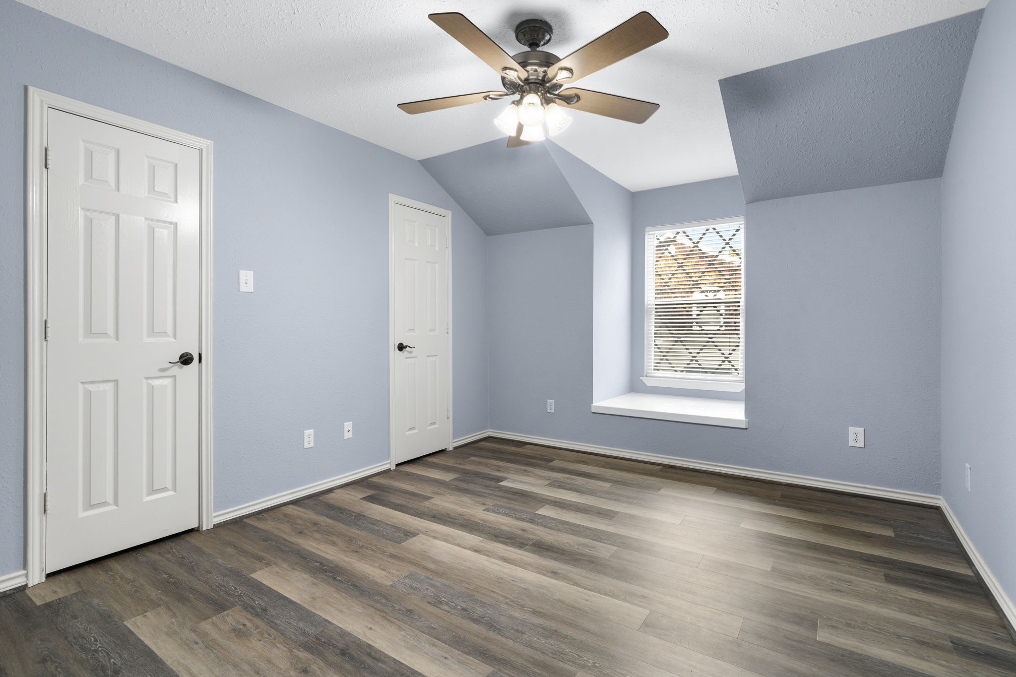 20002 Indigo Lake Drive Magnolia, TX 77355 - Photo 40 of 50 wooden floor in an empty room with a window