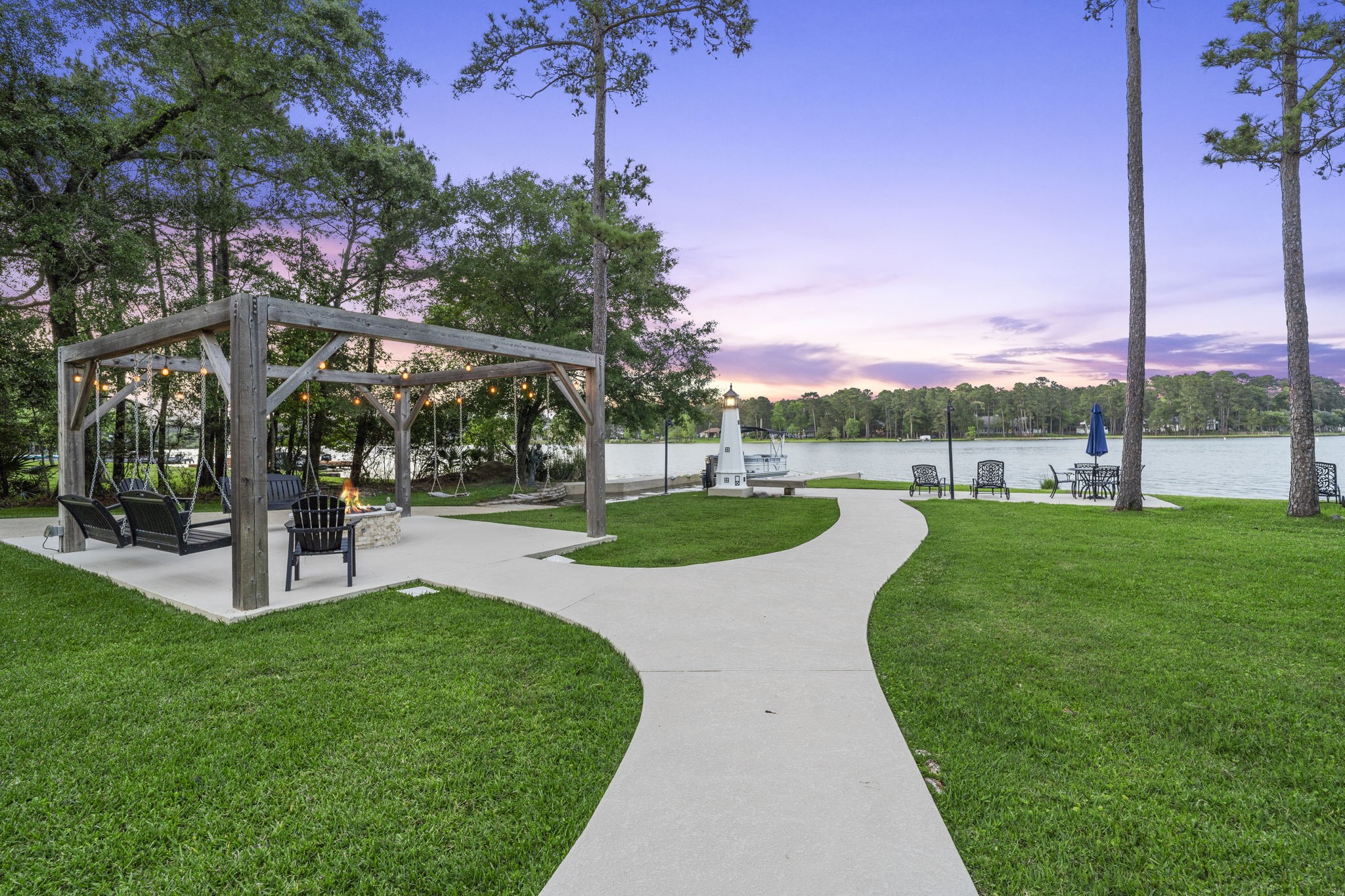 20002 Indigo Lake Drive Magnolia, TX 77355 - Photo 47 of 50 a view of a park with large trees