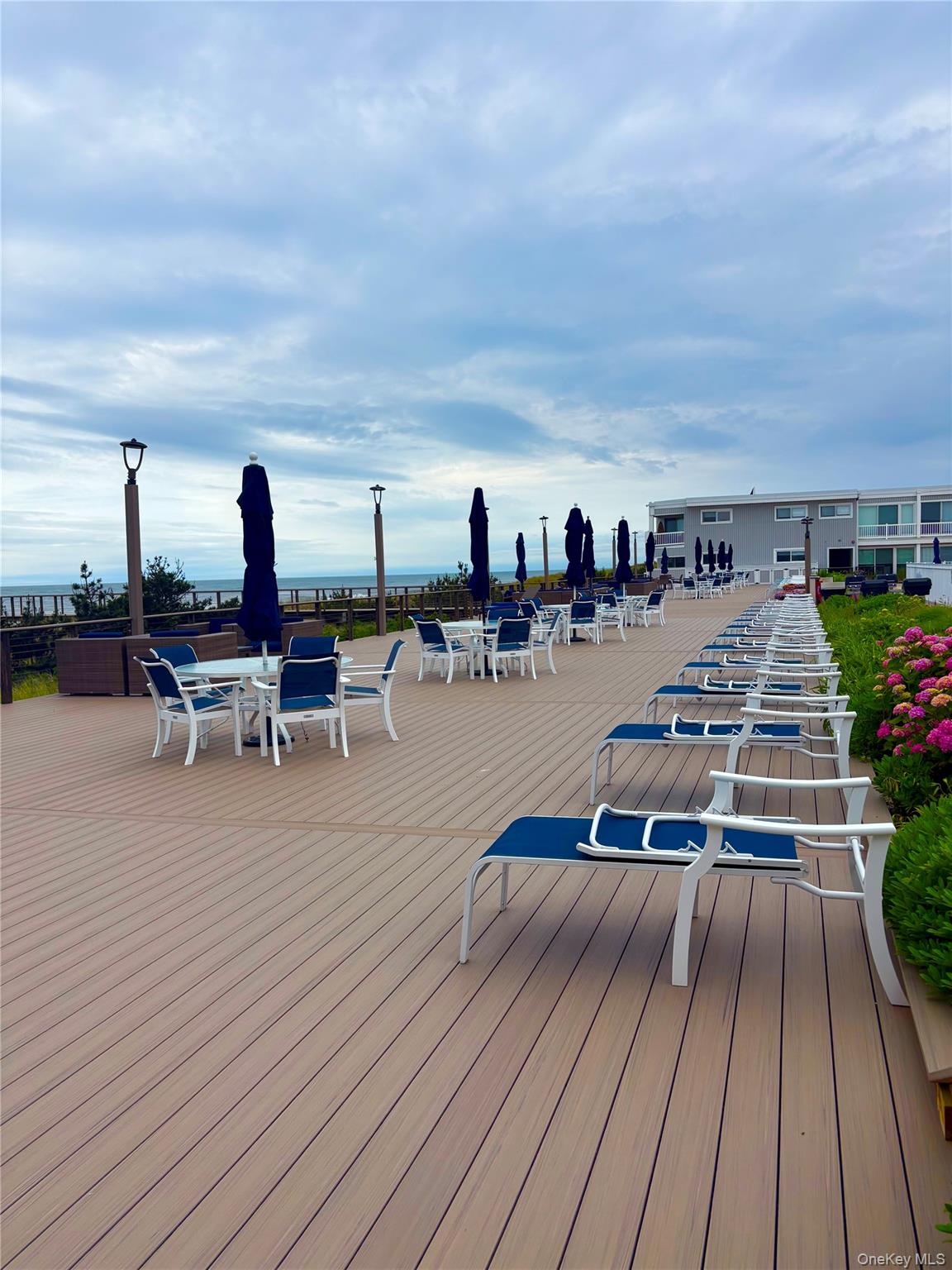 585 Dune Road, Unit A21 Westhampton Beach, NY 11978 - Photo 11 of 13 Ocean front Lounging