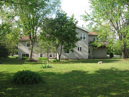 3929 Maple Avenue Northbrook, IL 60062 - Photo 16 of 16 a front view of a house with a yard