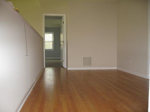 3929 Maple Avenue Northbrook, IL 60062 - Photo 8 of 16 a view of a hallway with wooden floor