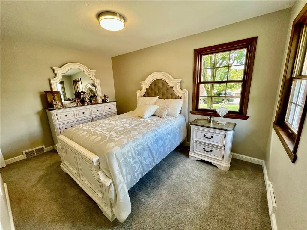 115 Bell Court Road McKees Rocks, PA 15136 - Photo 11 of 19 a bedroom with a bed and a dresser