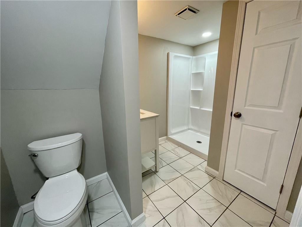 115 Bell Court Road McKees Rocks, PA 15136 - Photo 16 of 19 a bathroom with a toilet and a shower