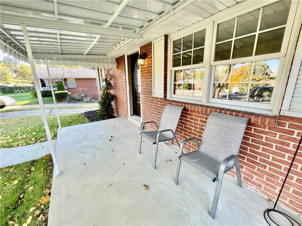 115 Bell Court Road McKees Rocks, PA 15136 - Photo 18 of 19 a view of an chairs and table in the patio with a yard