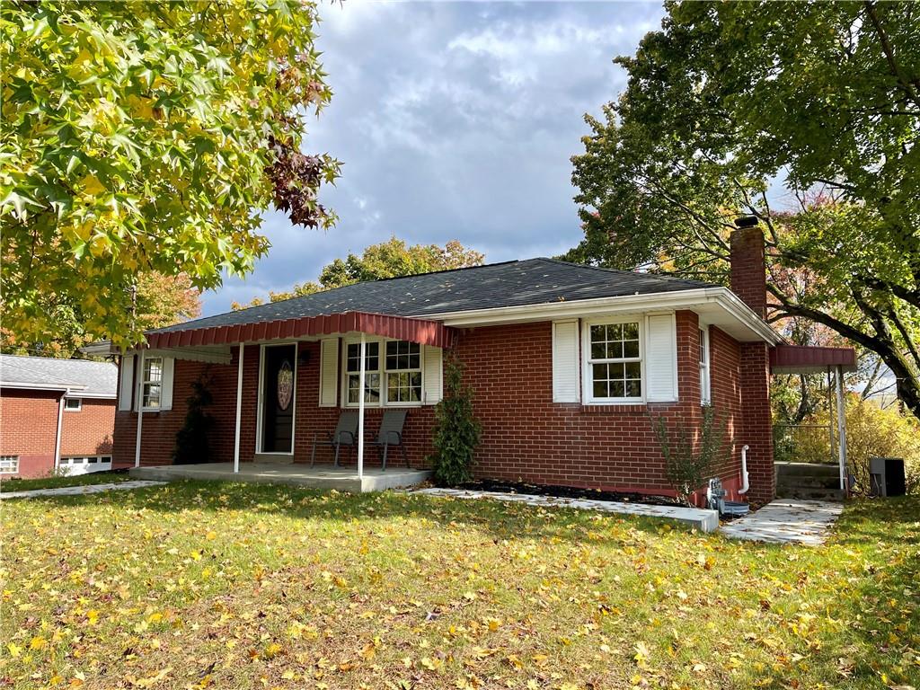 115 Bell Court Road McKees Rocks, PA 15136 - Photo 2 of 19 a view of a house with a backyard