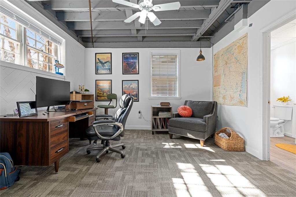 1436 Willivee Drive Decatur, GA 30033 - Photo 30 of 49 a living room with furniture a flat screen tv and a window