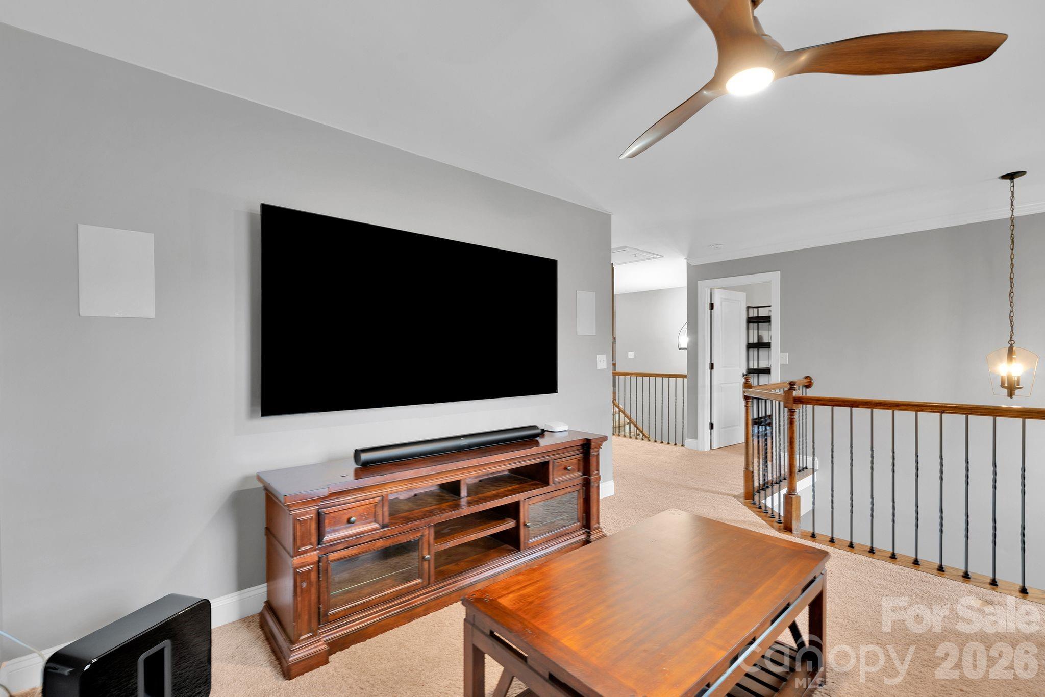 663 Highland Ridge Point Lake Wylie, SC 29710 - Photo 22 of 42 a living room with furniture and a flat screen tv