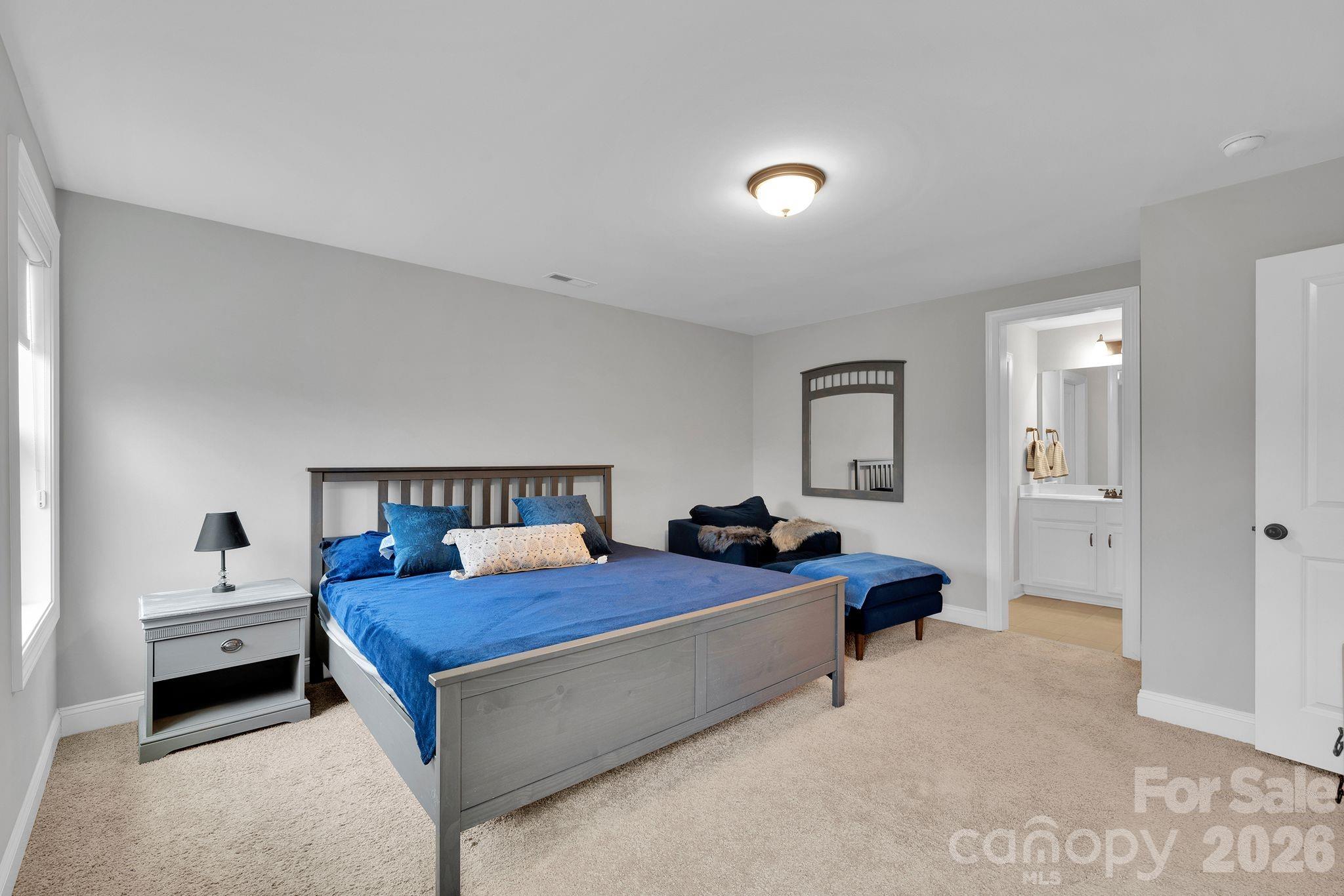 663 Highland Ridge Point Lake Wylie, SC 29710 - Photo 24 of 42 a bedroom with a bed and a view of bedroom