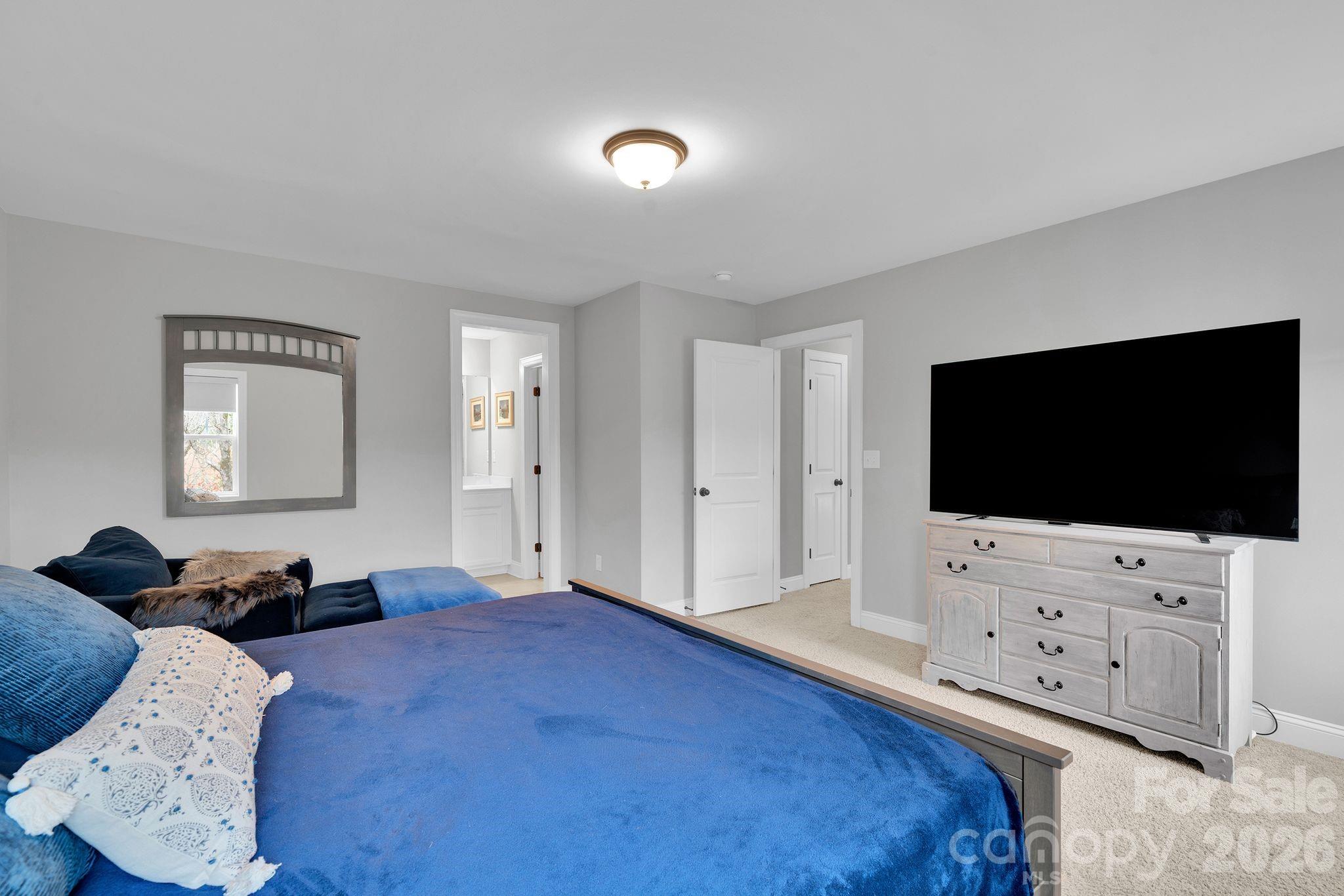663 Highland Ridge Point Lake Wylie, SC 29710 - Photo 25 of 42 a living room with furniture and a flat screen tv